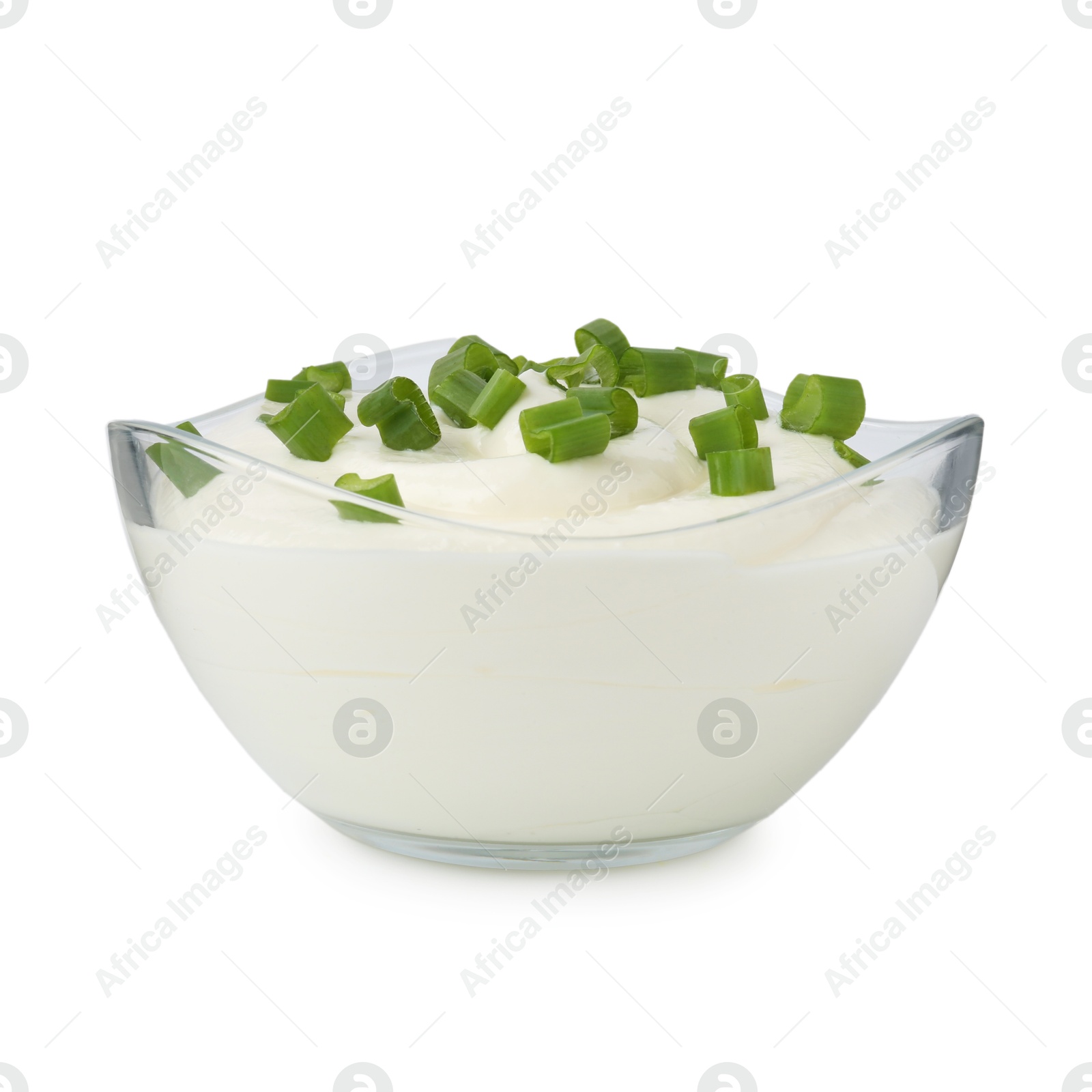 Photo of Delicious yogurt with green onions in bowl isolated on white