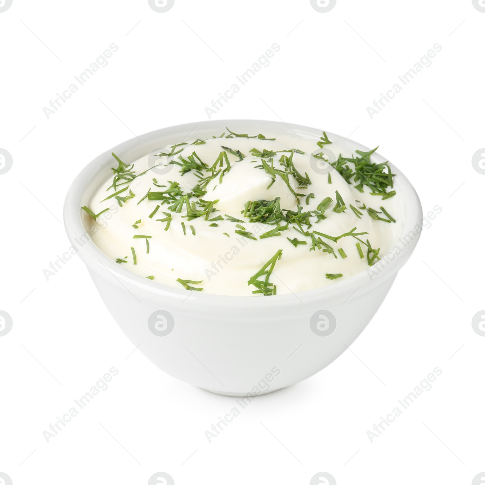 Delicious yogurt with dill in bowl isolated on white Photo of Delicious yogurt with dill in bowl isolated on white