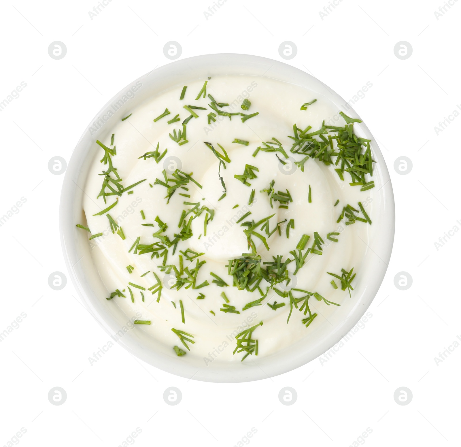 Delicious yogurt with dill in bowl isolated on white, top view Photo of Delicious yogurt with dill in bowl isolated on white, top view