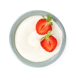 Photo of Delicious yogurt in bowl and strawberry isolated on white, top view