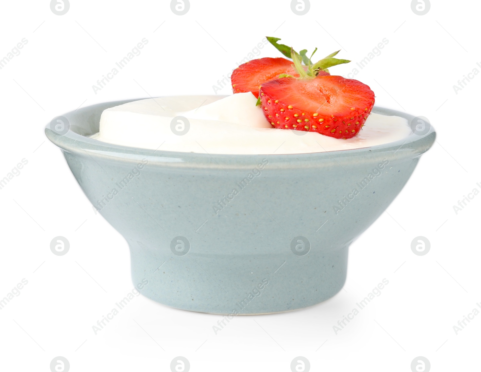 Delicious yogurt in bowl and strawberry isolated on white Photo of Delicious yogurt in bowl and strawberry isolated on white