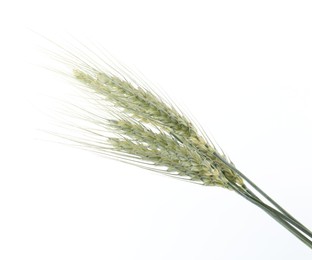 Photo of Many green wheat spikes on white background