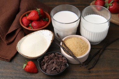 Photo of Different ingredients for panna cotta. Milk, sugar, vanilla, chocolate and strawberries on wooden table, closeup