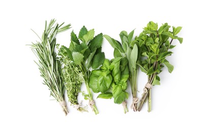 Photo of Different fresh green herbs isolated on white, top view