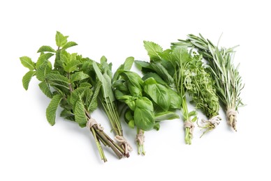 Photo of Different fresh green herbs isolated on white, above view