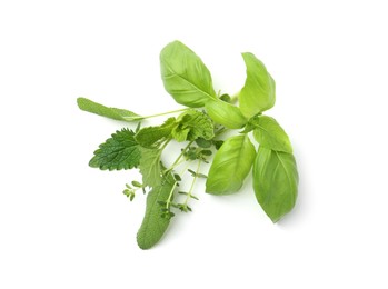 Photo of Different fresh green herbs isolated on white, above view