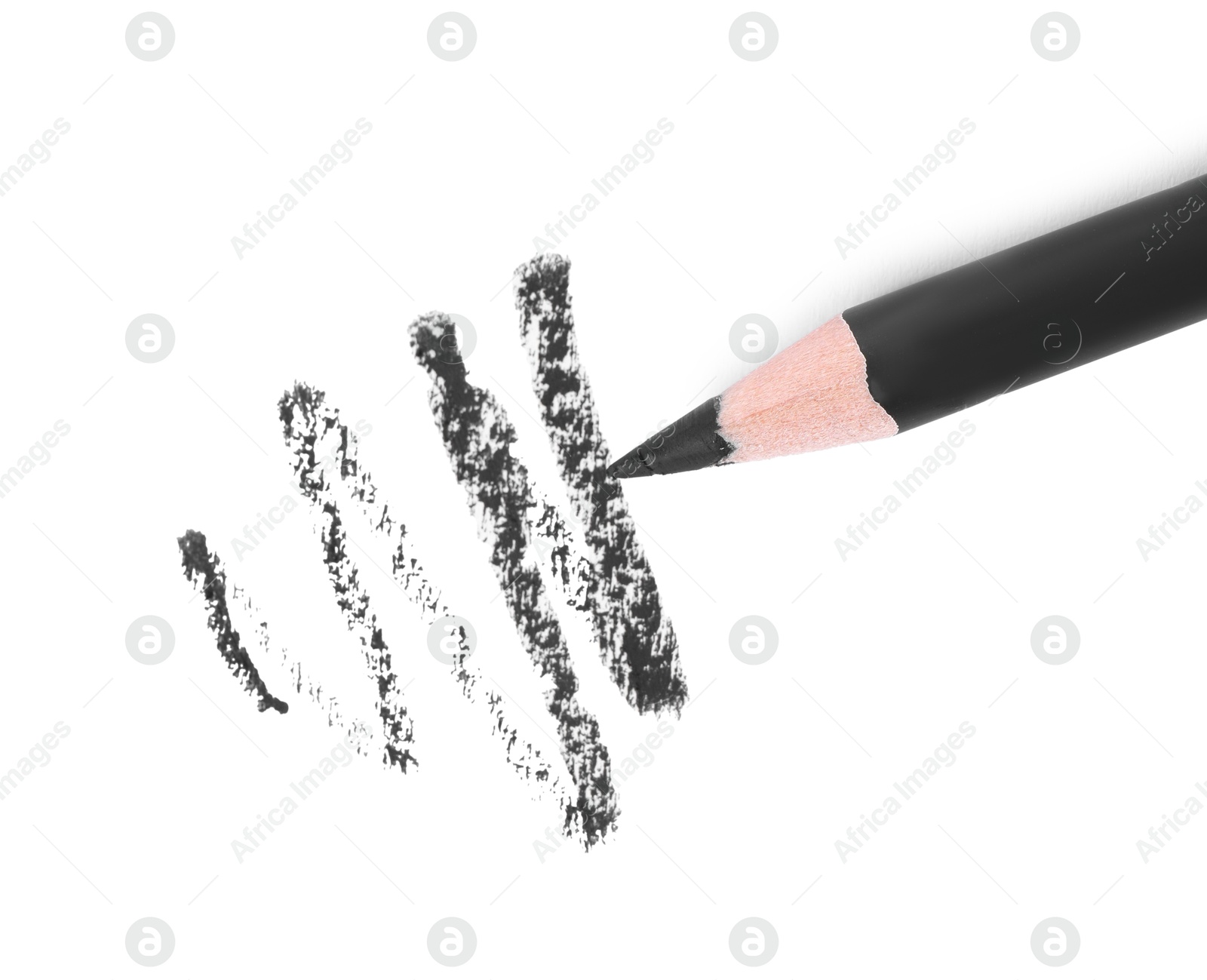 Black eyebrow pencil and strokes isolated on white, top view Photo of Black eyebrow pencil and strokes isolated on white, top view