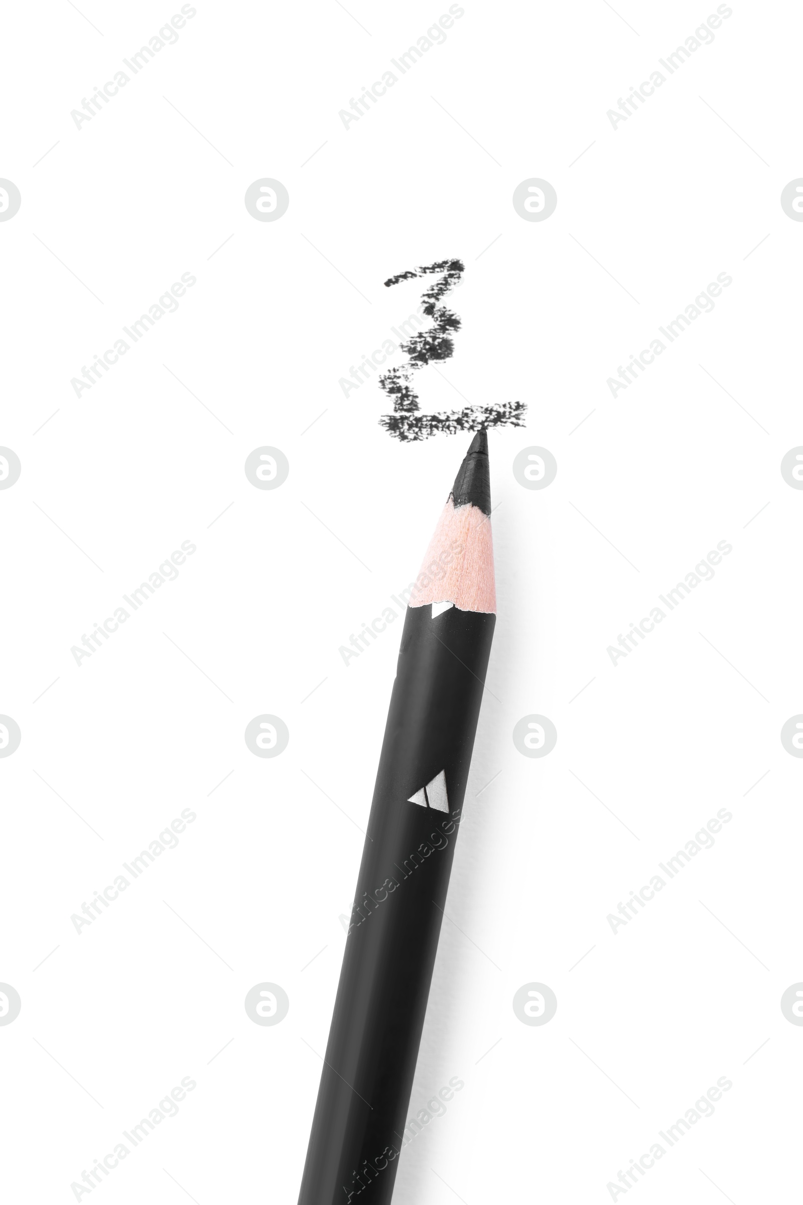 Black eyebrow pencil and strokes isolated on white, top view Photo of Black eyebrow pencil and strokes isolated on white, top view