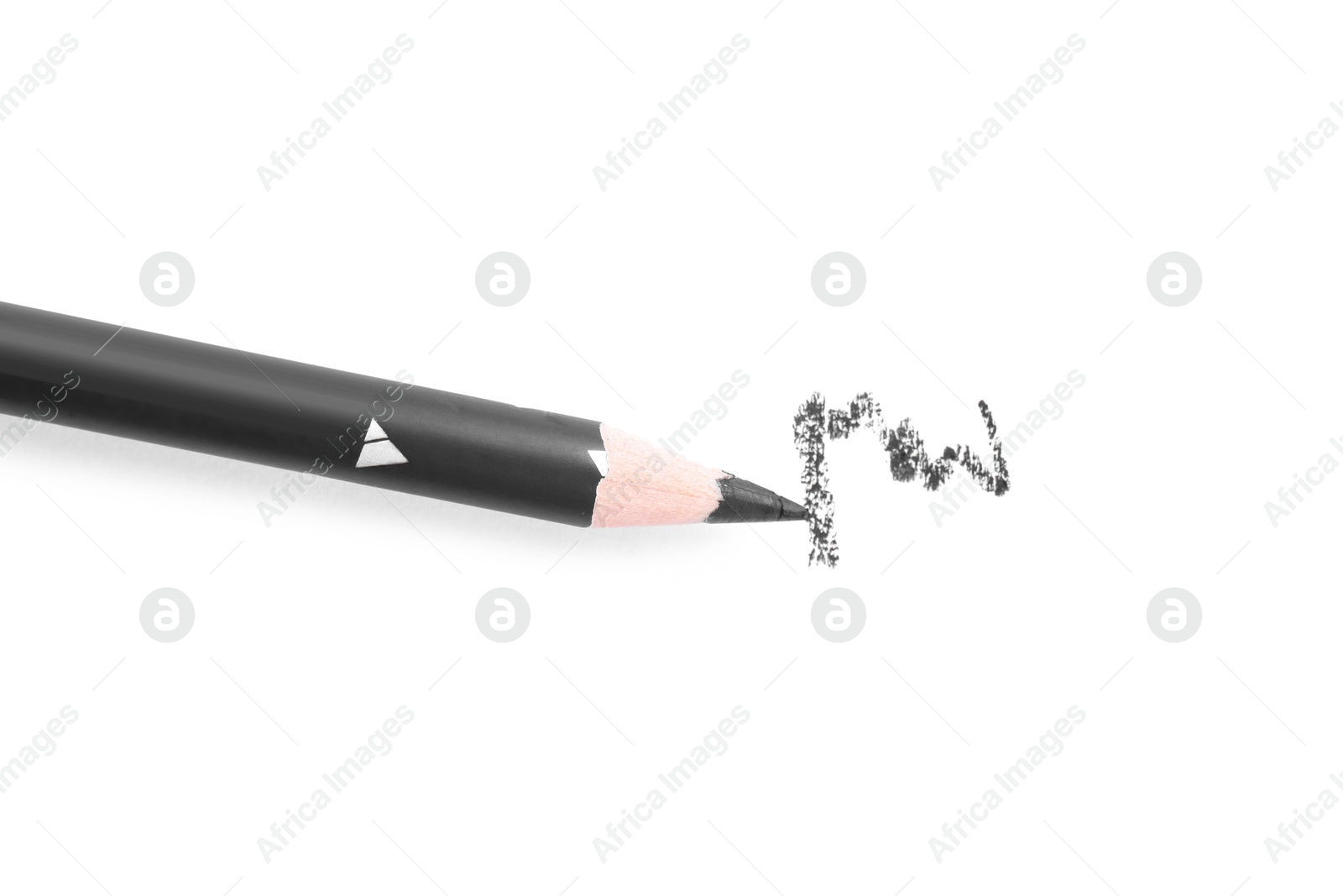 Black eyebrow pencil and strokes isolated on white, top view Photo of Black eyebrow pencil and strokes isolated on white, top view