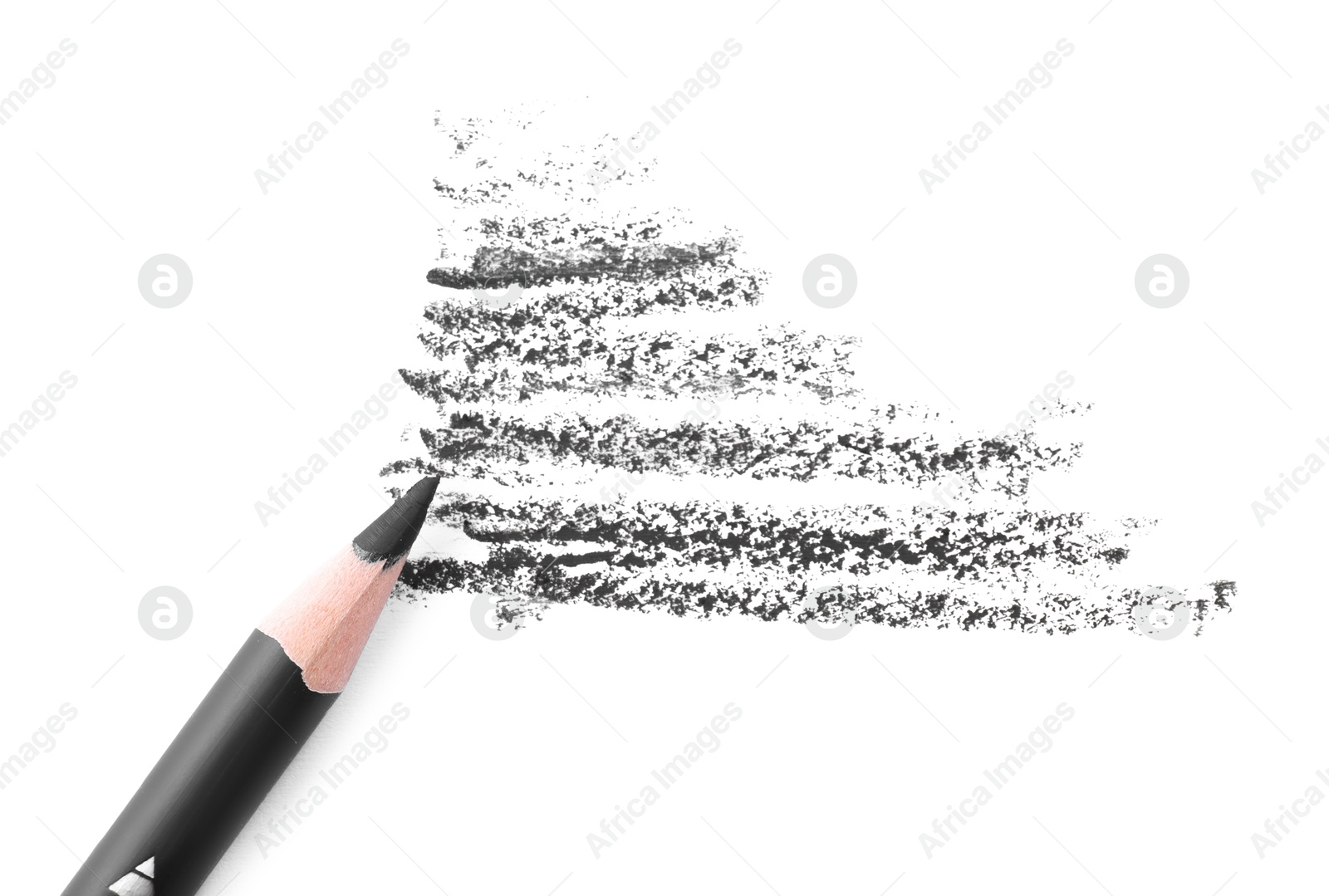 Black eyebrow pencil and strokes isolated on white, top view Photo of Black eyebrow pencil and strokes isolated on white, top view