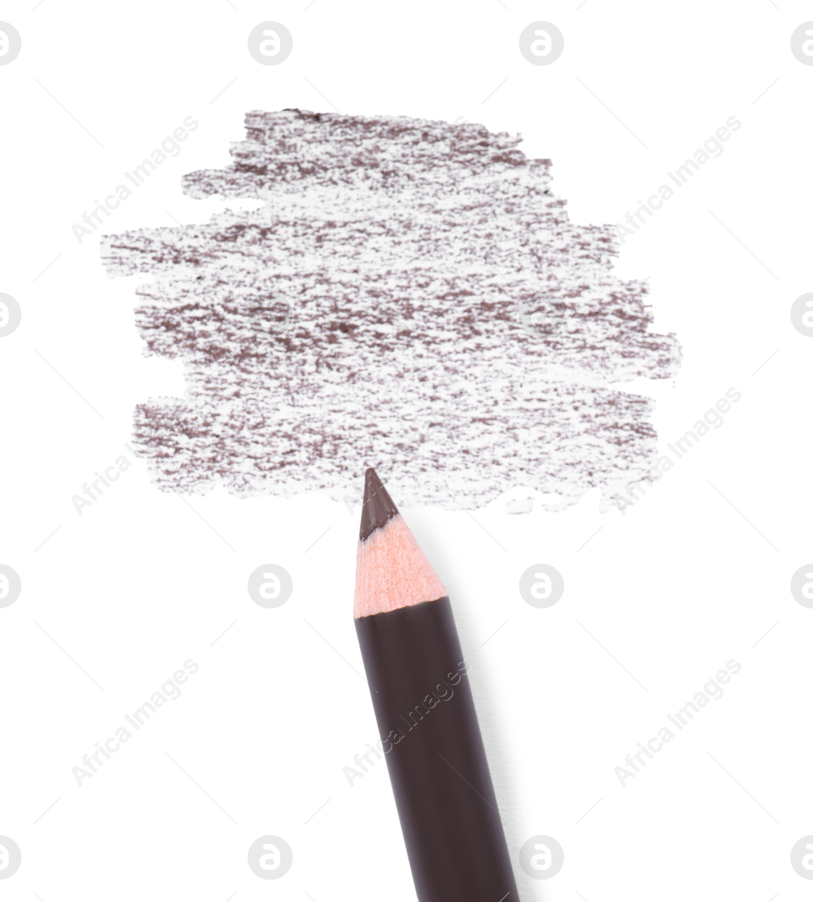 Brown eyebrow pencil and strokes isolated on white, top view Photo of Brown eyebrow pencil and strokes isolated on white, top view