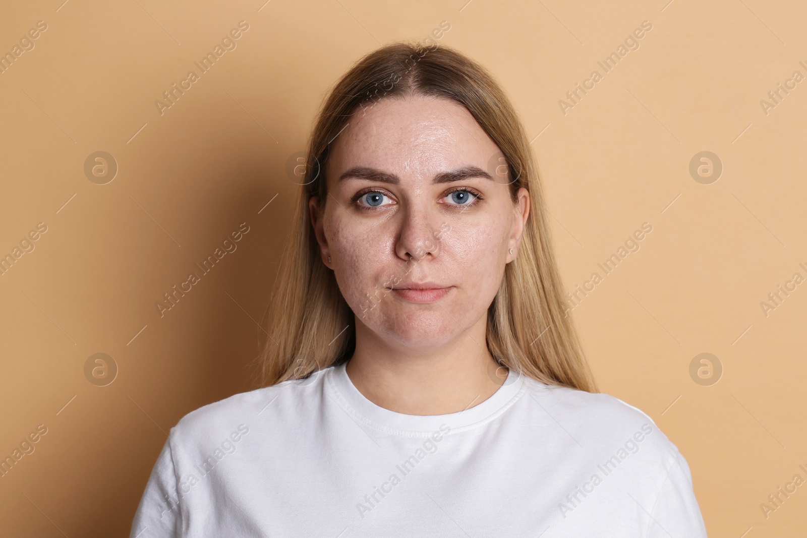 Portrait of beautiful woman on beige background Photo of Portrait of beautiful woman on beige background