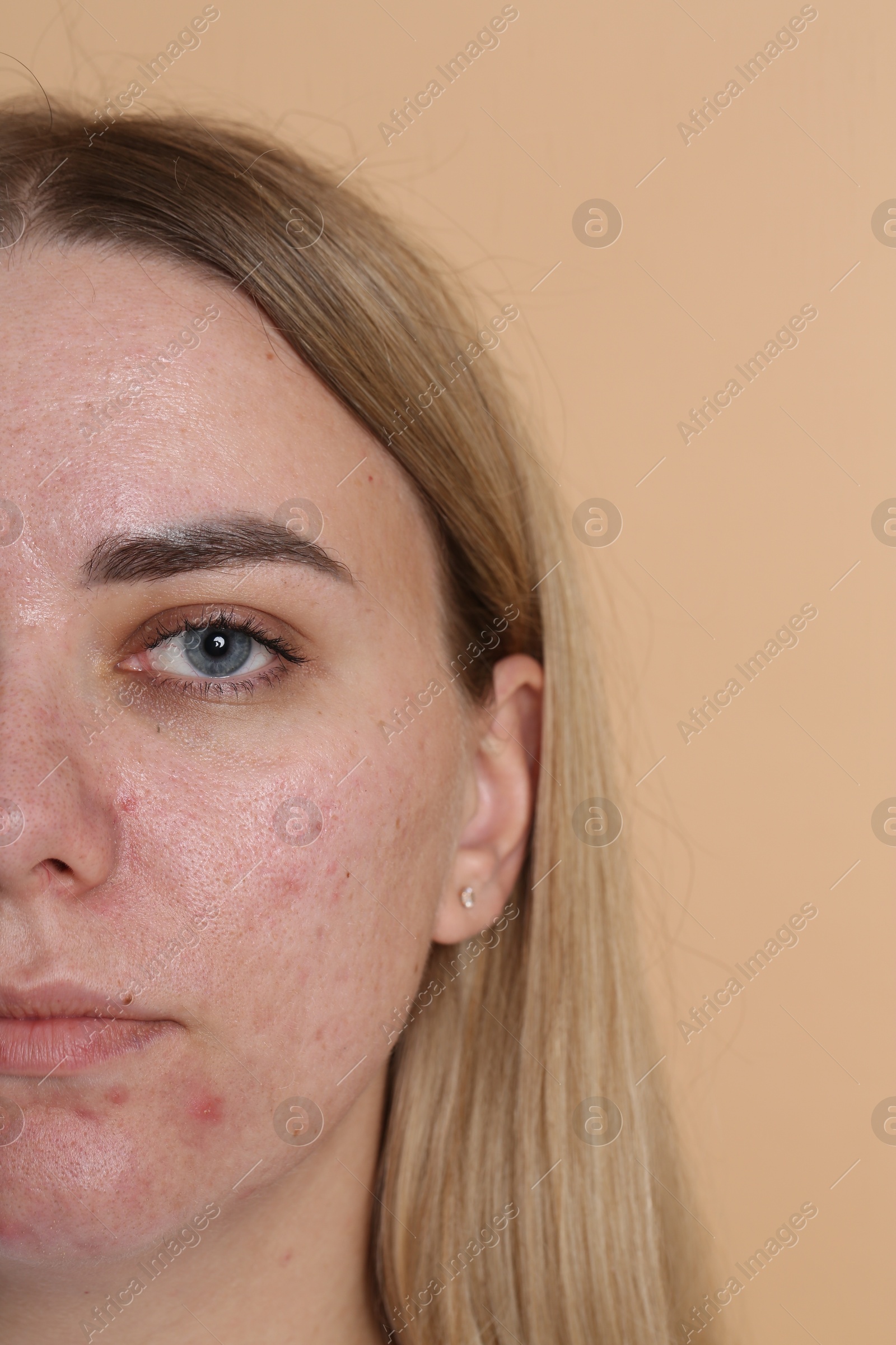Closeup view of woman on beige background Photo of Closeup view of woman on beige background