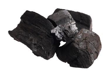 Photo of Pieces of black coals isolated on white