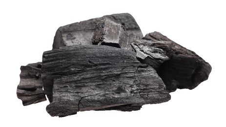 Photo of Pieces of black coals isolated on white