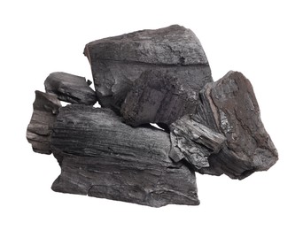 Photo of Pieces of black coals isolated on white