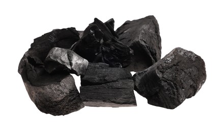 Photo of Pieces of black coals isolated on white