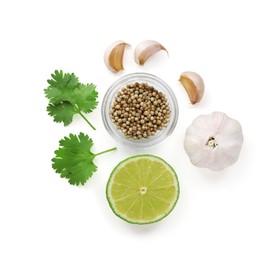 Photo of Fresh cilantro, coriander seeds, lime and garlic isolated on white, top view
