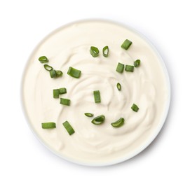 Photo of Tasty sour cream with green onions in bowl isolated on white, top view