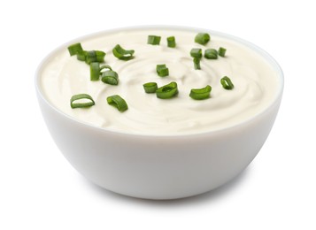 Photo of Tasty sour cream with green onions in bowl isolated on white
