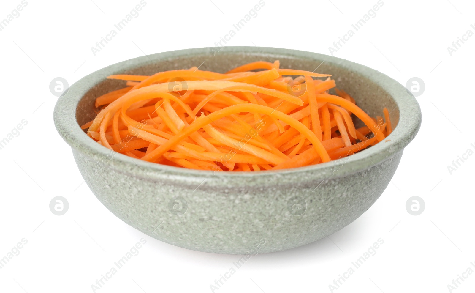 Raw carrot noodles in bowl isolated on white. Vegetarian dish Photo of Raw carrot noodles in bowl isolated on white. Vegetarian dish