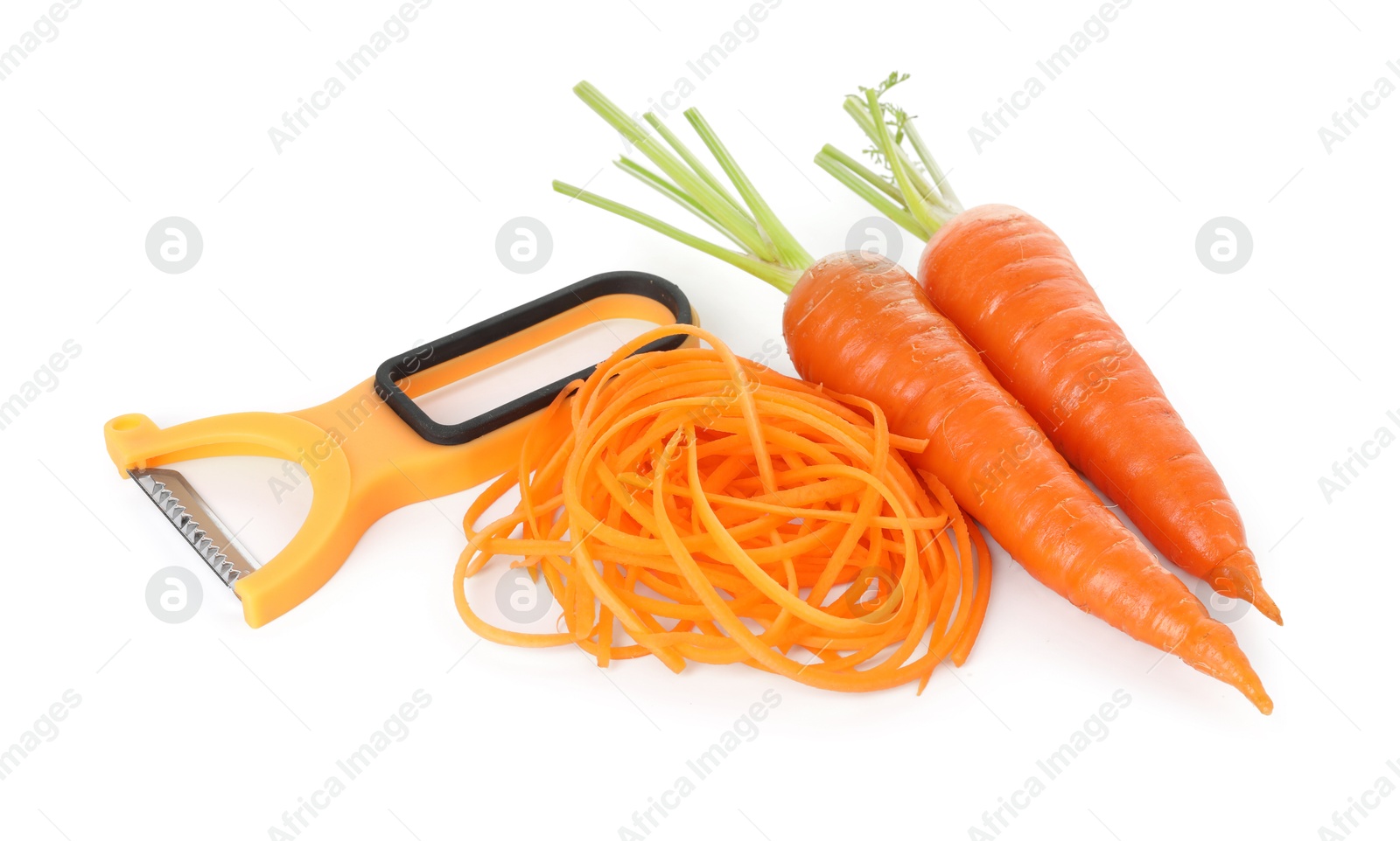 Raw carrot noodles, peeler and fresh vegetables isolated on white. Vegetarian dish Photo of Raw carrot noodles, peeler and fresh vegetables isolated on white. Vegetarian dish