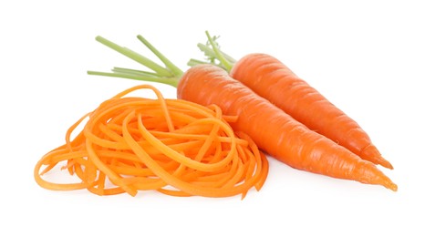 Photo of Raw carrot noodles and fresh vegetables isolated on white. Vegetarian dish