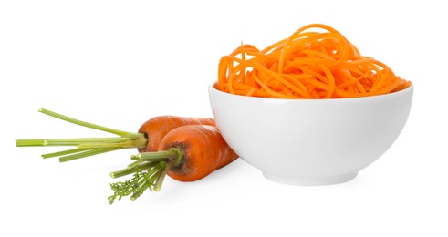Photo of Raw carrot noodles and fresh vegetables isolated on white. Vegetarian dish
