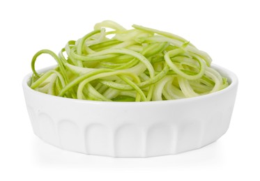 Photo of Raw squash noodles in bowl isolated on white. Vegetarian dish