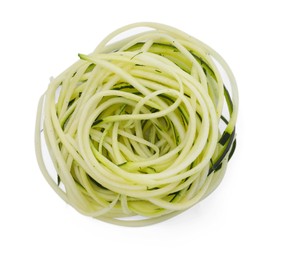 Photo of Raw zucchini noodles in bowl isolated on white, top view. Vegetarian dish