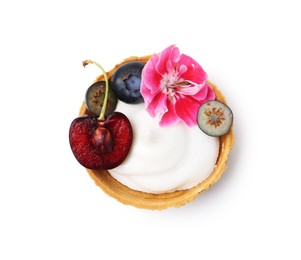 Photo of One sweet tartlet with berries and flower isolated on white, top view. Delicious dessert