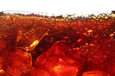 Photo of Refreshing cola with ice isolated on white