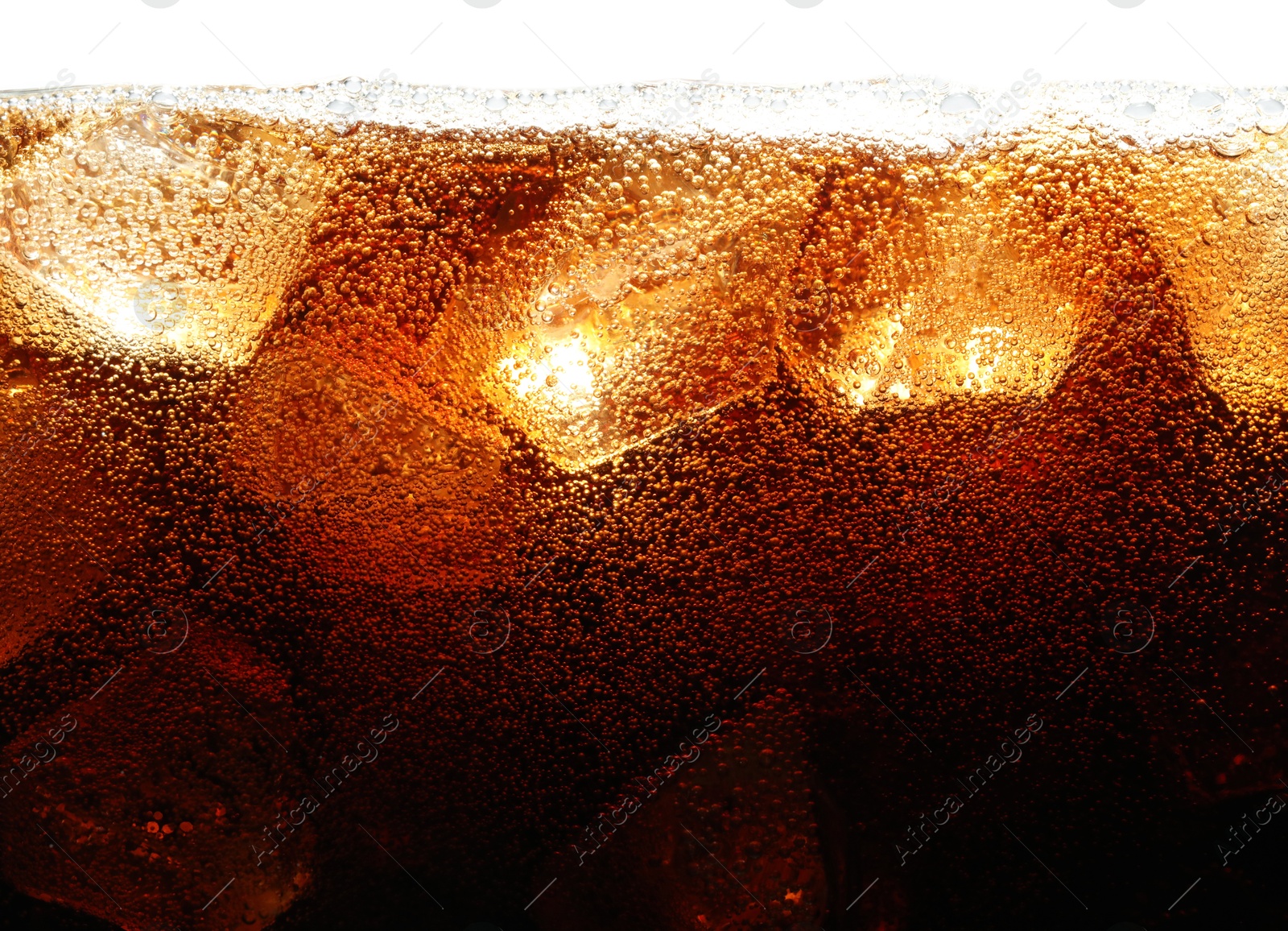Refreshing cola with ice on white background, closeup Photo of Refreshing cola with ice on white background, closeup