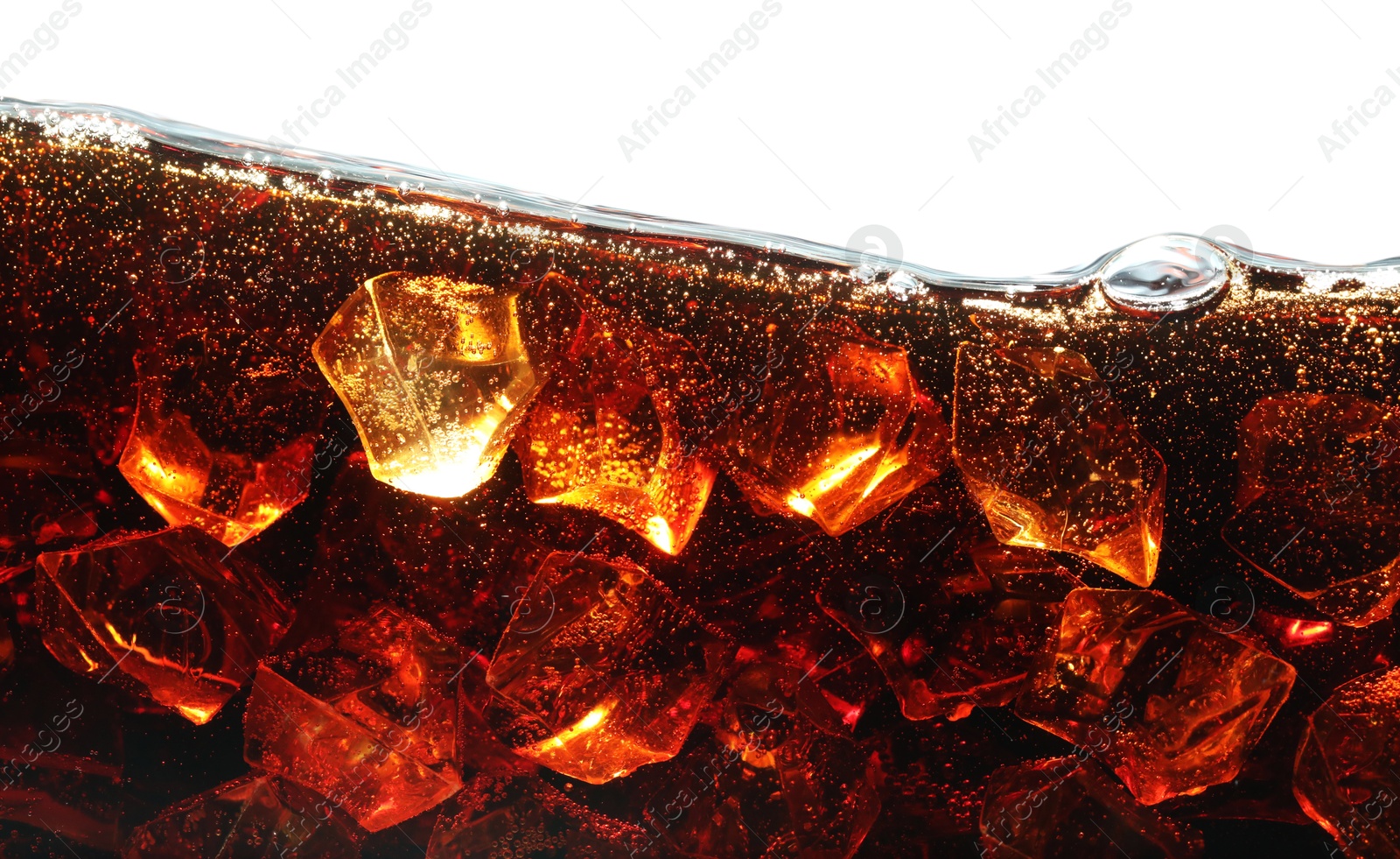 Refreshing cola with ice isolated on white Photo of Refreshing cola with ice isolated on white