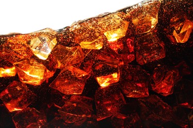 Photo of Refreshing cola with ice isolated on white