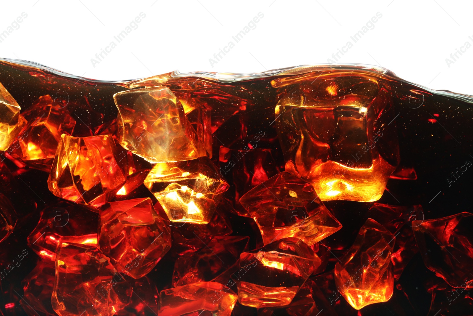 Refreshing cola with ice isolated on white Photo of Refreshing cola with ice isolated on white