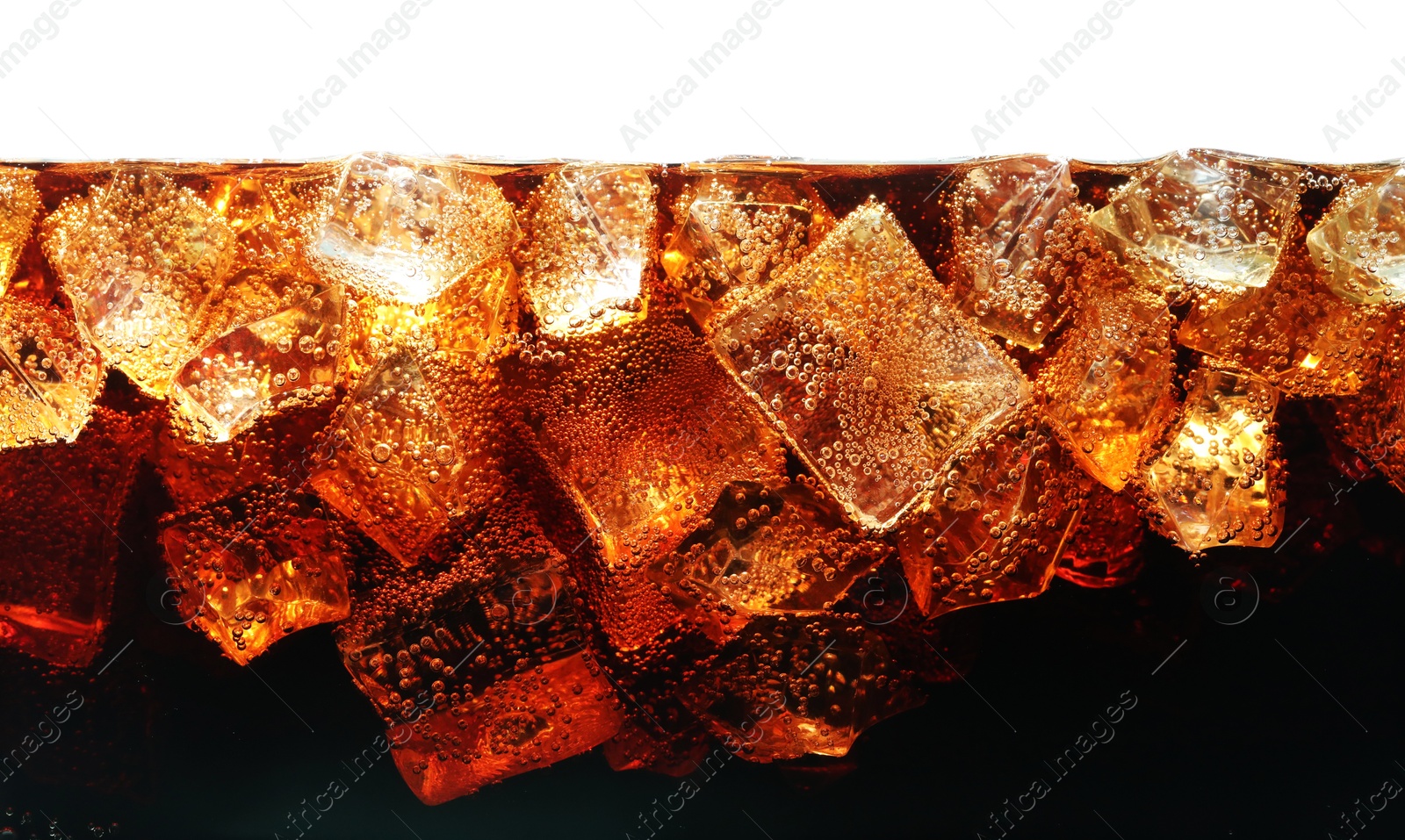 Refreshing cola with ice isolated on white Photo of Refreshing cola with ice isolated on white
