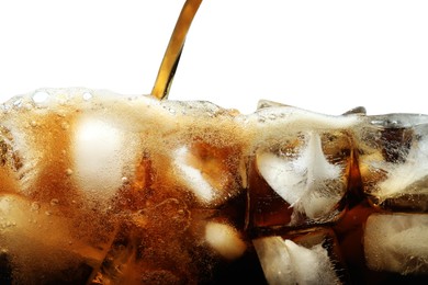 Photo of Pouring refreshing cola into glass with ice isolated on white