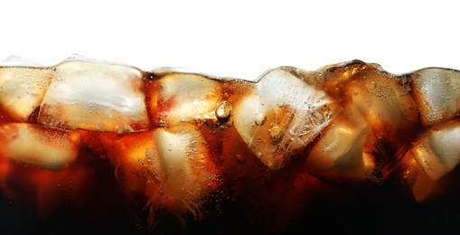 Photo of Refreshing cola with ice isolated on white, closeup