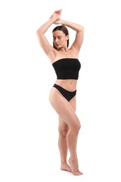 Photo of Fit woman with perfect body on white background
