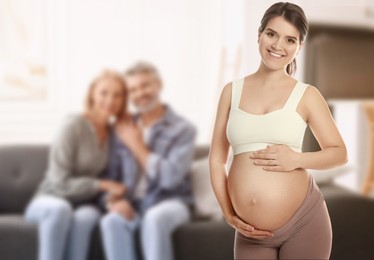 Image of Surrogate mother and intended parents indoors, selective focus
