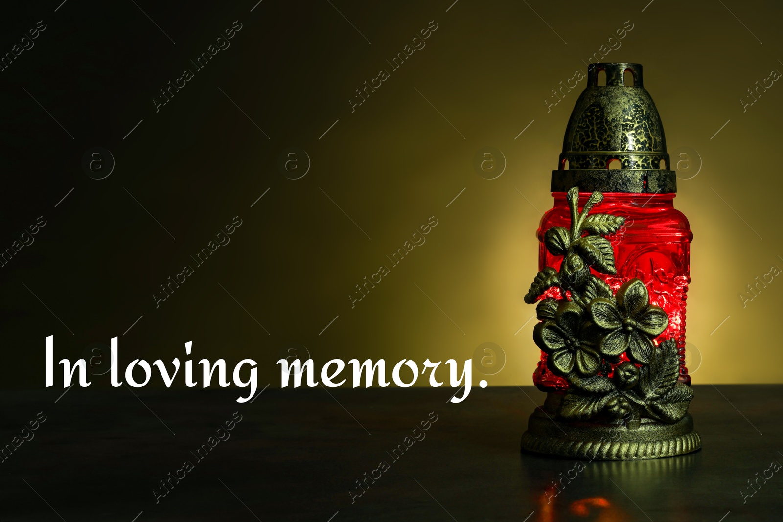 In loving memory. Red grave light on table in darkness Image of In loving memory. Red grave light on table in darkness