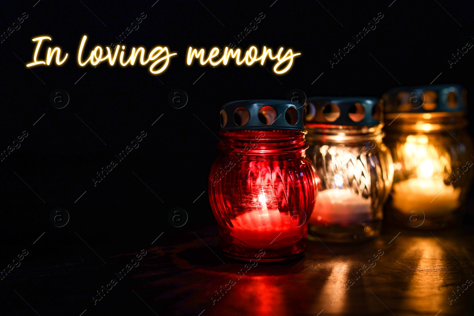 In loving memory. Grave lights on table in darkness Image of In loving memory. Grave lights on table in darkness