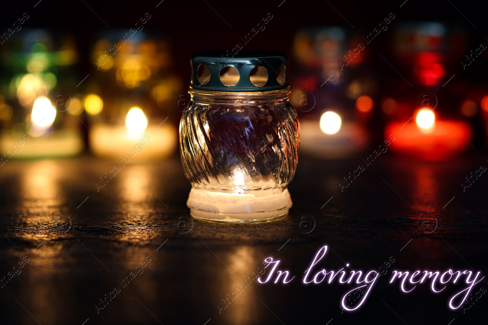 In loving memory. Many different grave lights on table in darkness Image of In loving memory. Many different grave lights on table in darkness