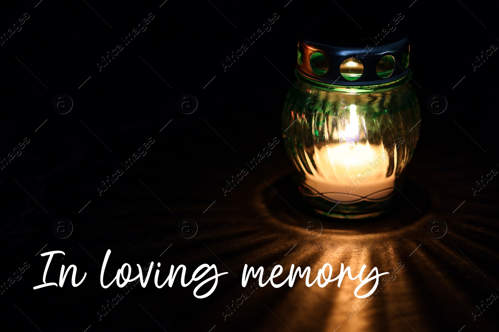 In loving memory. Grave light with burning candle on table in darkness Image of In loving memory. Grave light with burning candle on table in darkness