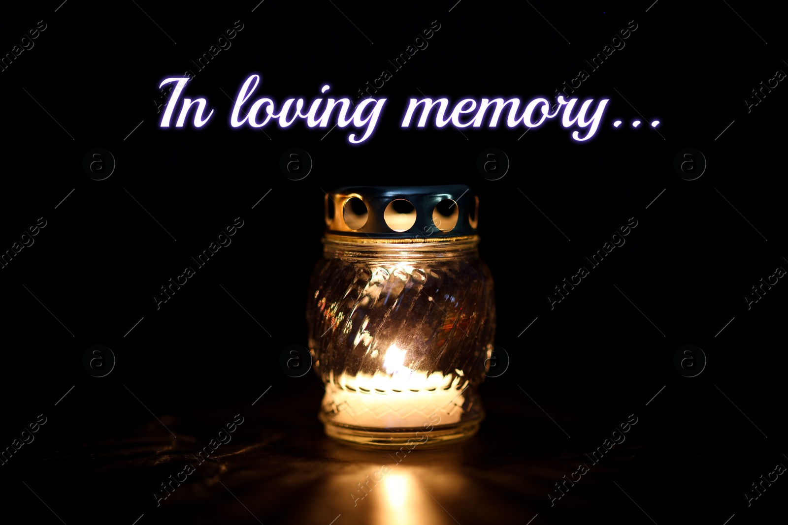 In loving memory. Grave light with burning candle on table in darkness Image of In loving memory. Grave light with burning candle on table in darkness