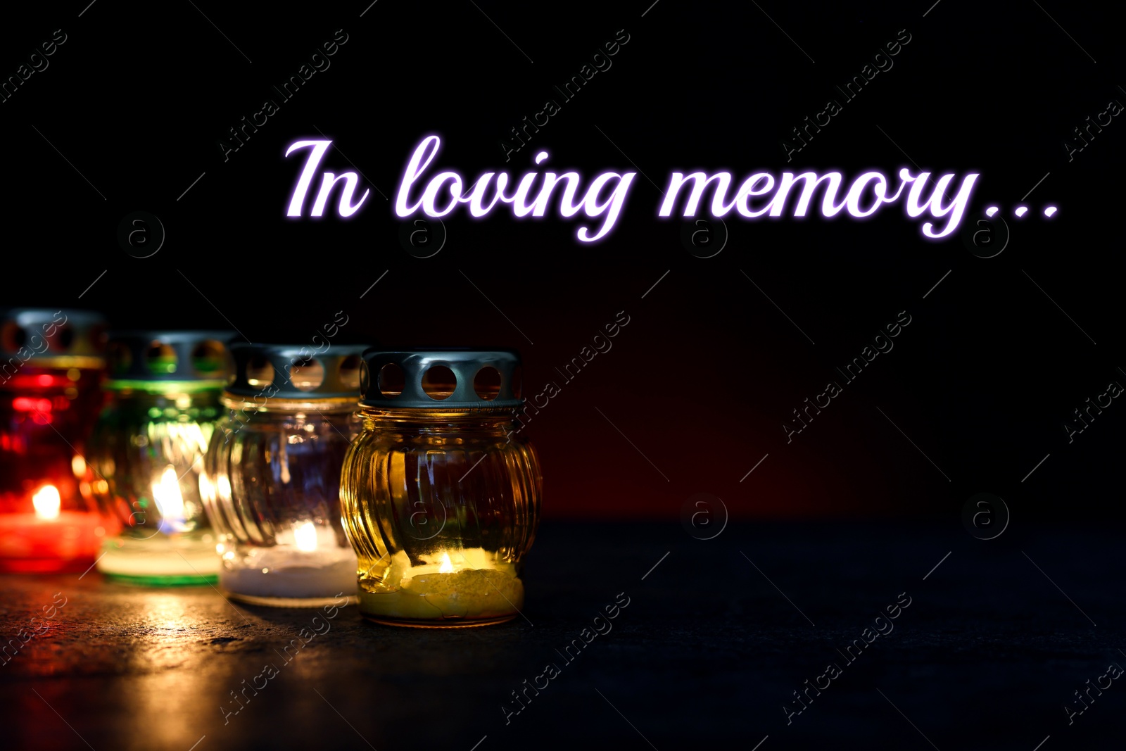 In loving memory. Many different grave lights on table in darkness Image of In loving memory. Many different grave lights on table in darkness