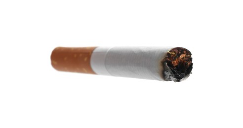 Photo of One burnt cigarette butt isolated on white