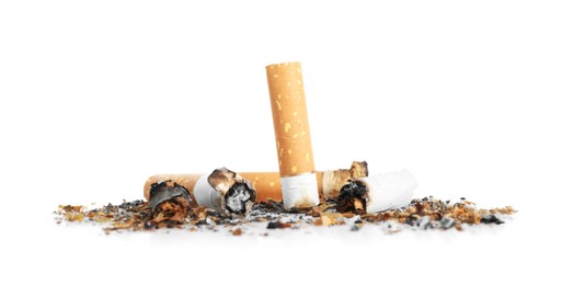 Photo of Cigarette butts with ash isolated on white