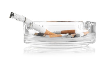 Photo of Cigarette butts in ashtray isolated on white